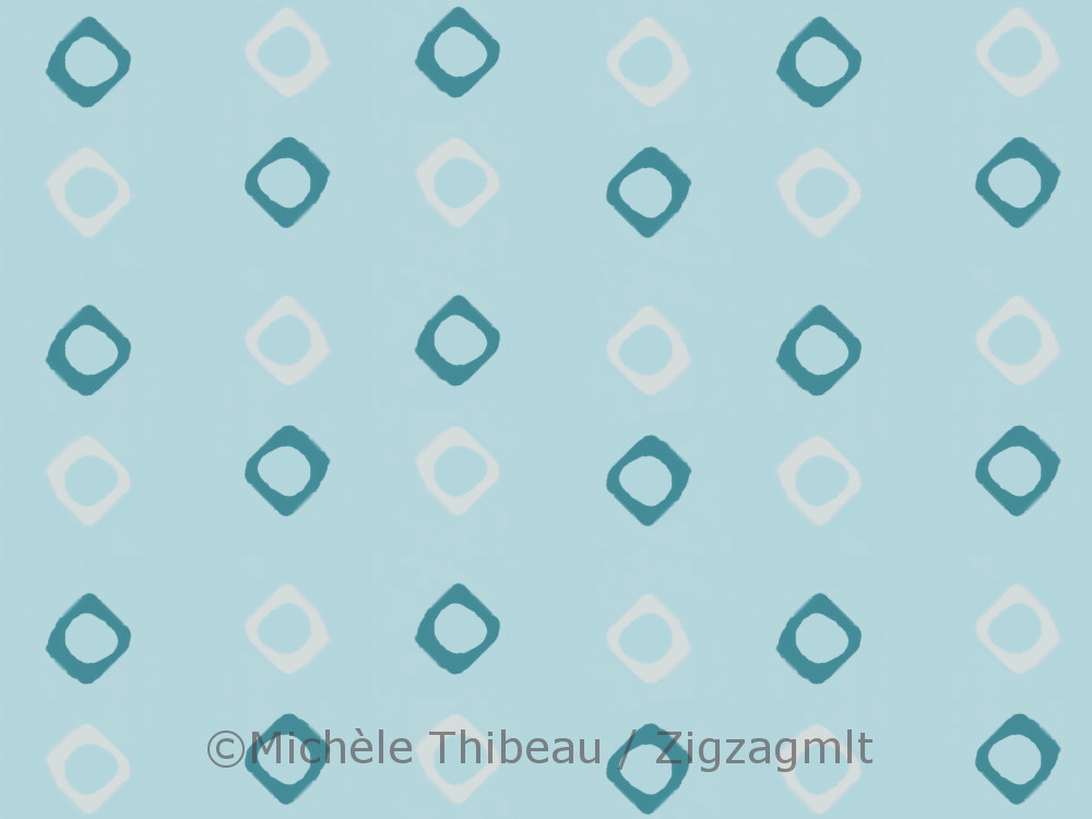 The same muted sky-blur background. Two-tone, white and blue diamond-shaped painted polka dots.
